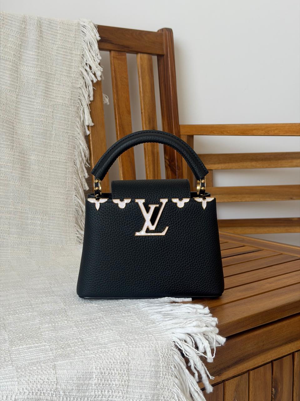 Ladies L*vi.   Bags.