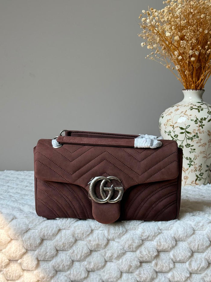 Ladies G**CI bags.