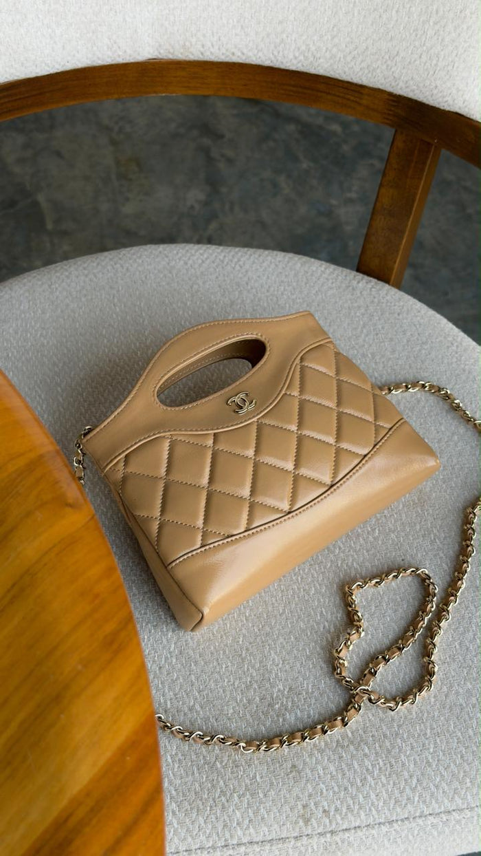 Ladies CH**NEL bags.